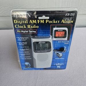 Jensen JCR-250 Digital AM/FM Pocket Alarm Clock Radio Silver Portable Snooze